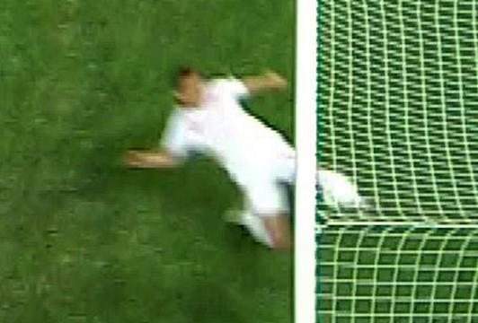 CONTROVERSY ... John Terry hooks Marko Devic's effort clear after it crossed the goal line